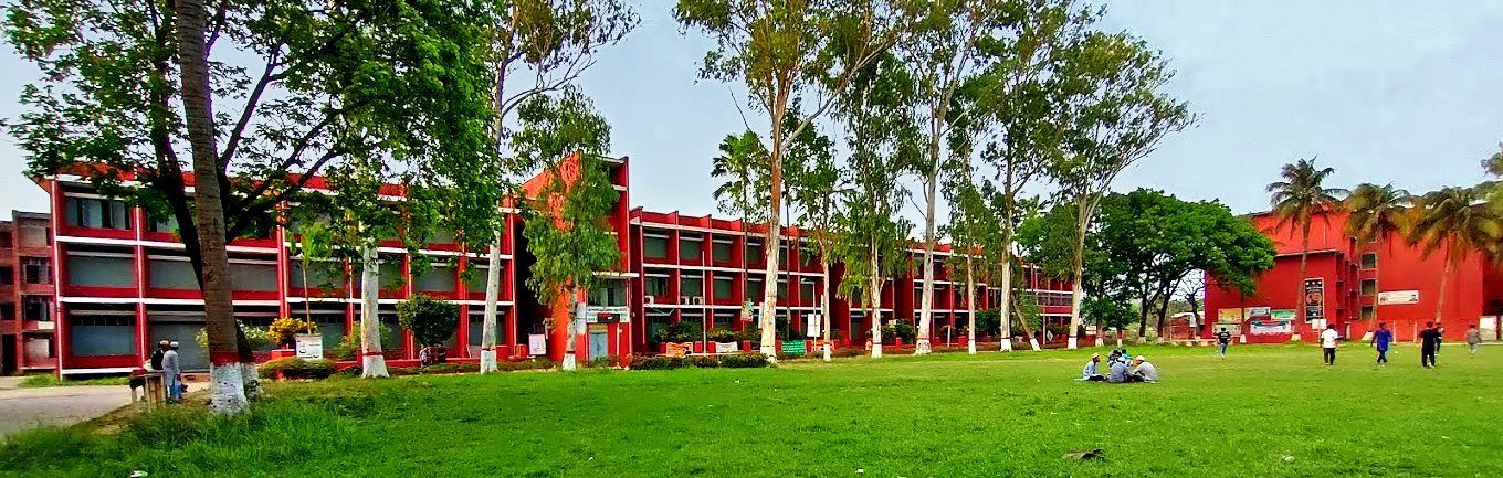 The main campus lawn in front of the red-brick blocks