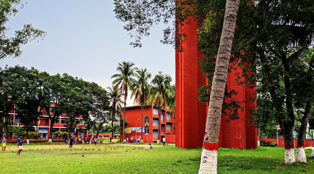 The red-brick tower and palms on the Pabna Polytechnic Institute campus